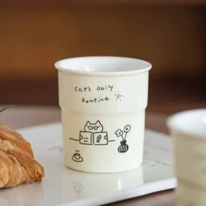 Tasse à café avec des caricatures de chat